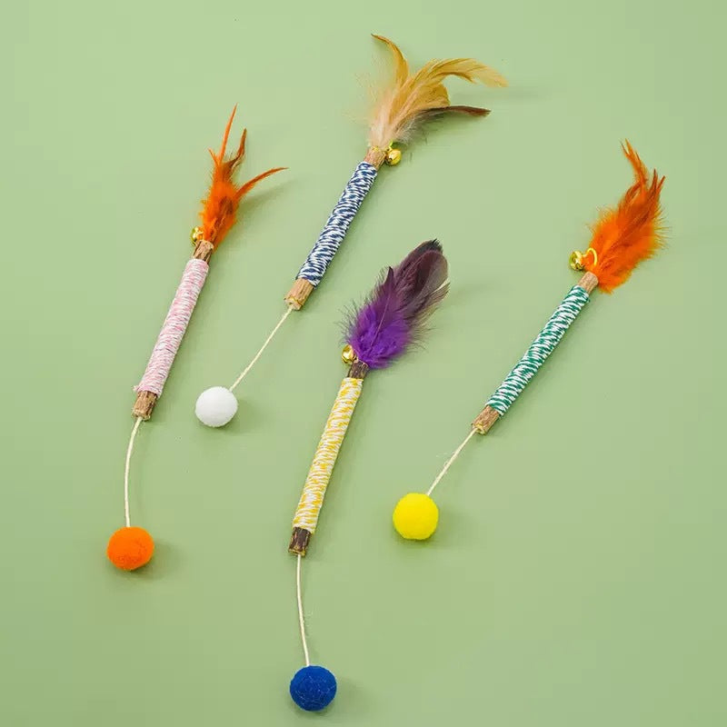 Silvervine Stick with Feather & Bell